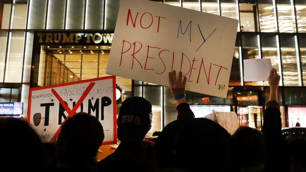 PHOTO: Dozens of anti-Donald Trump protesters stand along 5th Avenue in front of Trump Tower as New Yorkers react for a second night to the election of Trump as president of the United States, Nov. 10, 2016 in New York City.