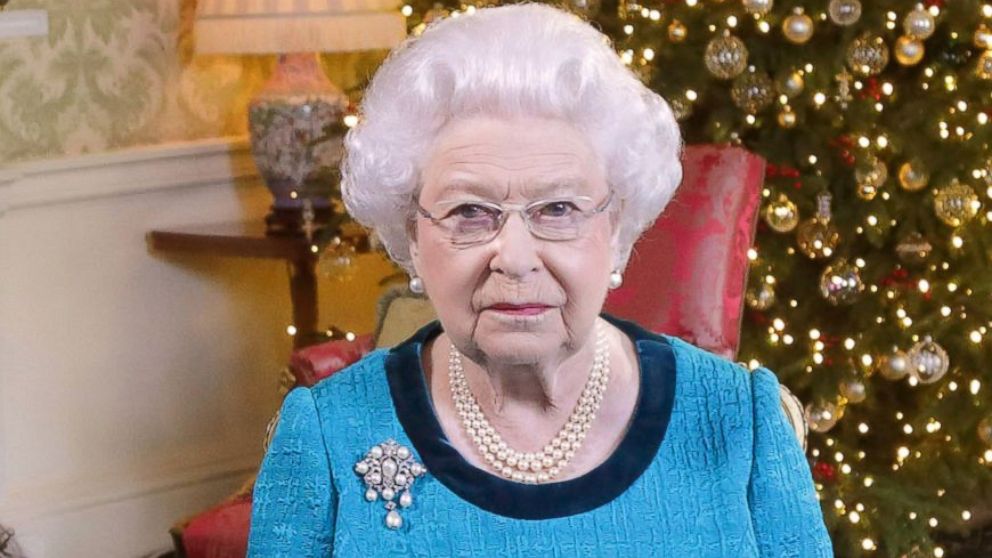 PHOTO: Queen Elizabeth II sits at a desk in the Regency Room after recording her Christmas Day broadcast to the Commonwealth at Buckingham Palace, Dec. 24, 2016 in London.