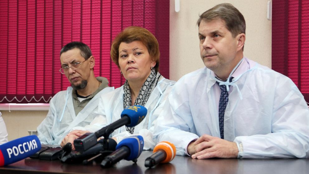 Medical staff hold a press conference following an accident where people  poisoned themselves with fake alcohol-containing liquid "Boyaryshnik," Hawthorn infusion, in Irkutsk, Russia, Dec. 20, 2016. 