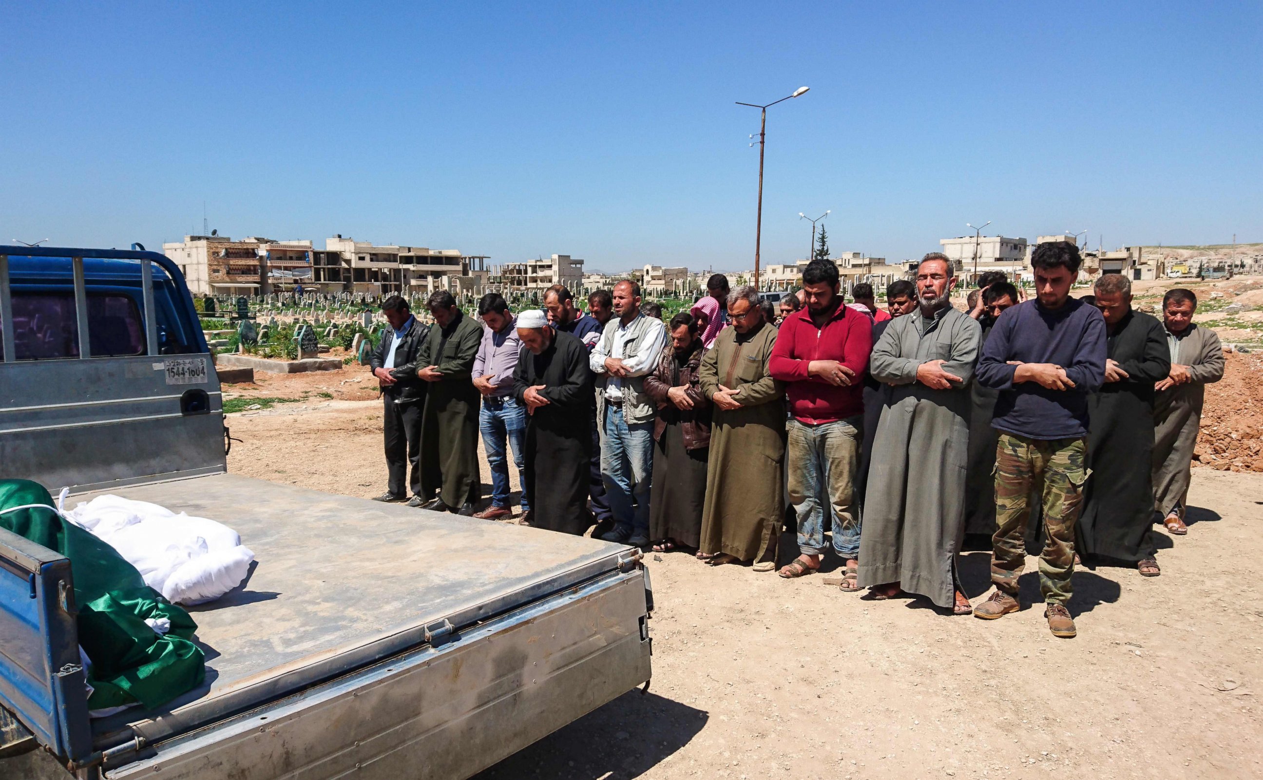 PHOTO: Syrians hold funeral prayers before they bury the bodies of victims of a a suspected toxic gas attack in Khan Sheikhun, a rebel-held town in Syria's Idlib province, April 5, 2017.