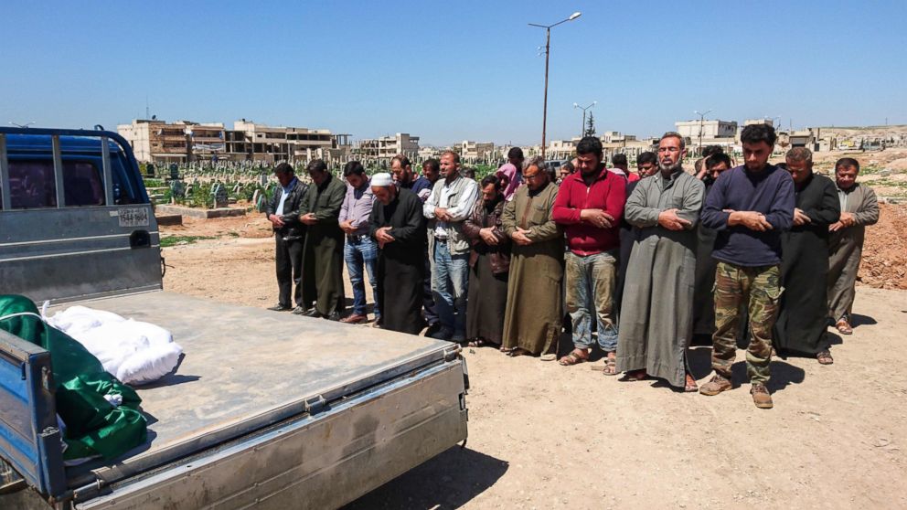 PHOTO: Syrians hold funeral prayers before they bury the bodies of victims of a a suspected toxic gas attack in Khan Sheikhun, a rebel-held town in Syria's Idlib province, April 5, 2017.
