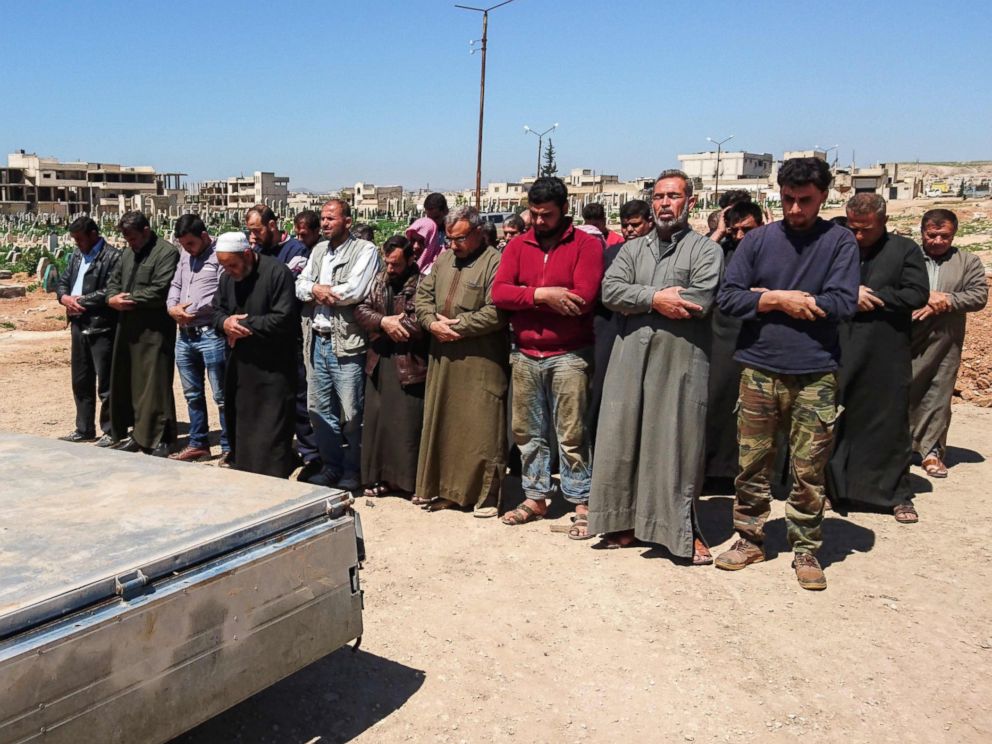 PHOTO: Syrians hold funeral prayers before they bury the bodies of victims of a a suspected toxic gas attack in Khan Sheikhun, a rebel-held town in Syrias Idlib province, April 5, 2017.
