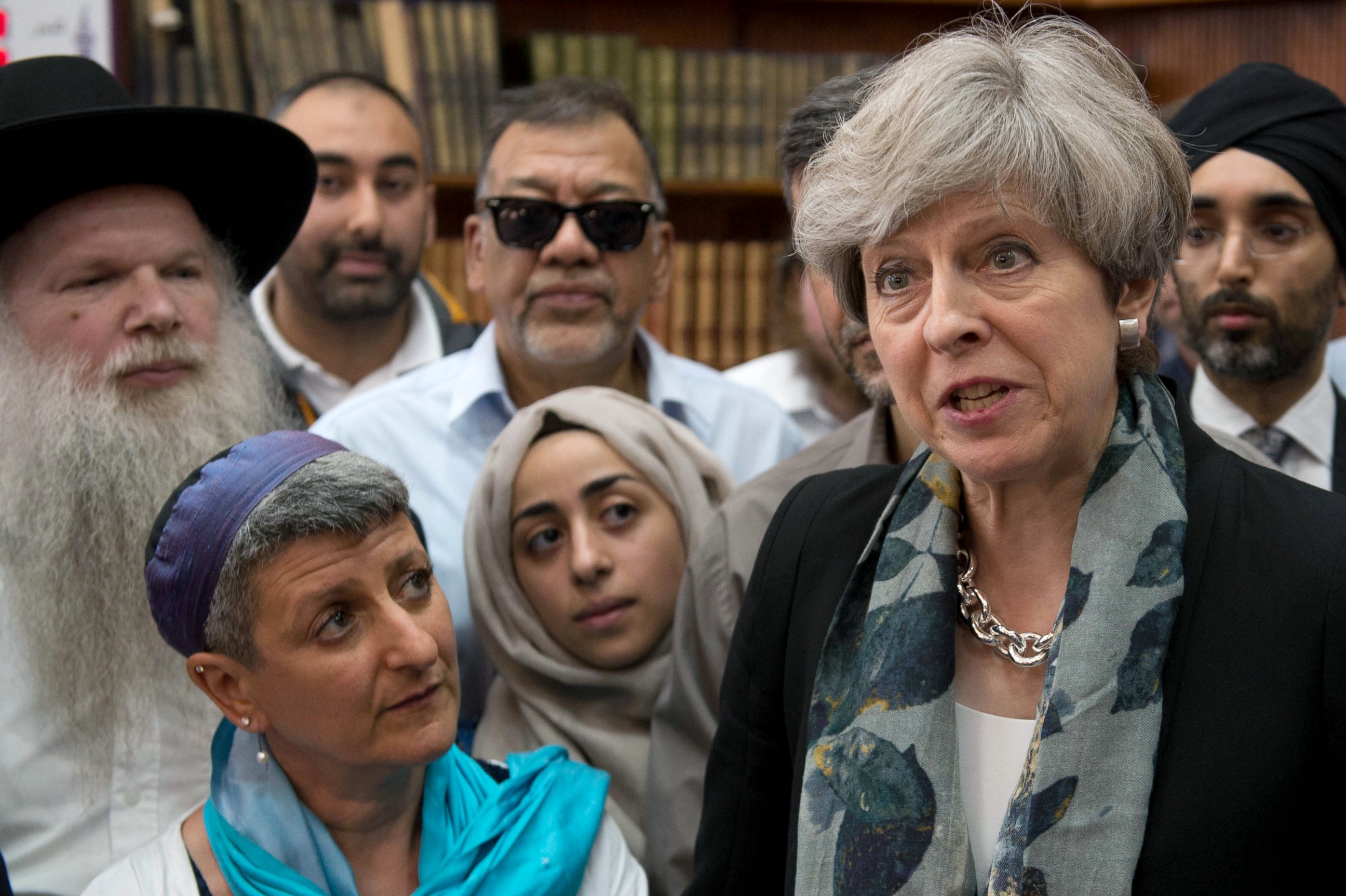 PHOTO: British Prime Minister Theresa May talks to faith leaders at Finsbury Park Mosque, June 19, 2017, in London.