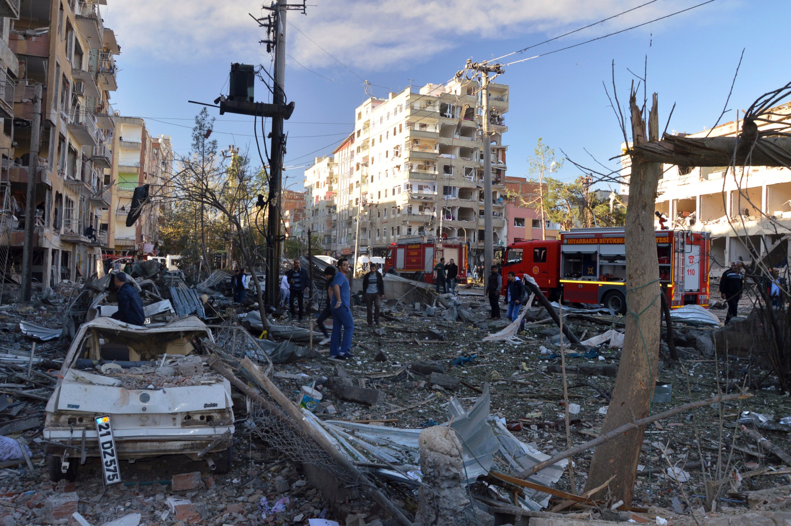 PHOTO: People watch the damage after an explosion in southeastern Turkish city of Diyarbakir, Nov. 4, 2016.