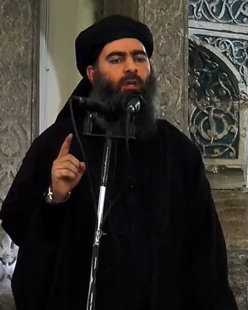 PHOTO: An image grab taken from a video released on July 5, 2014 by Al-Furqan Media shows alleged Islamic State of Iraq and the Levant (ISIL) leader Abu Bakr al-Baghdadi preaching during Friday prayer at a mosque in Mosul.