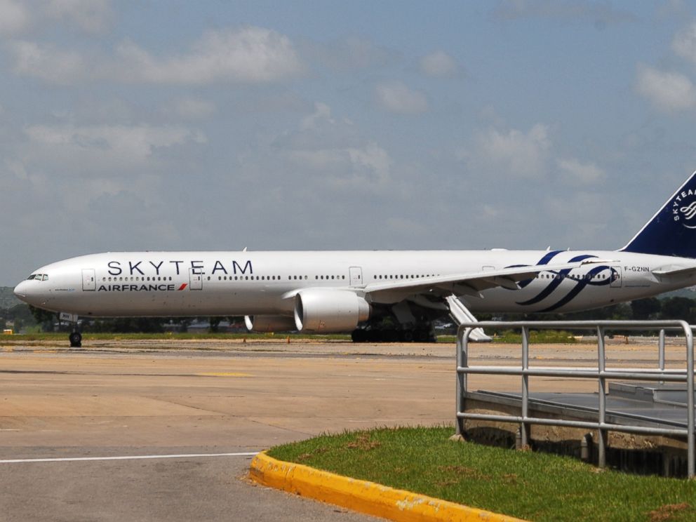 PHOTO: A picture taken on December 20, 2015 shows an Air France flight from Mauritius to Paris grounded at the Moi International Airport in Mombasa, after a suspected bomb was found on board.