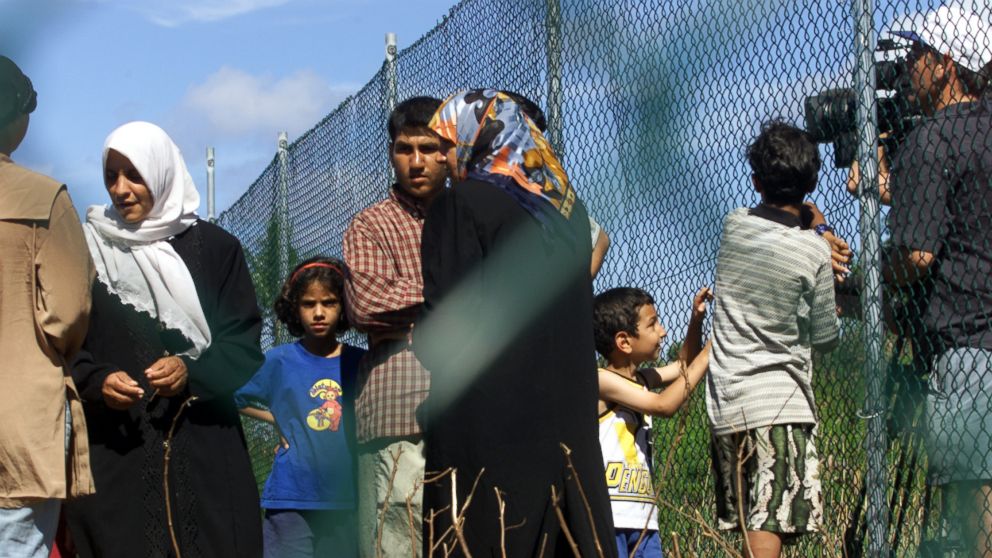 
	Asylum seekers on their first day in the compound at Nauru after they were refused entry to Australia.
