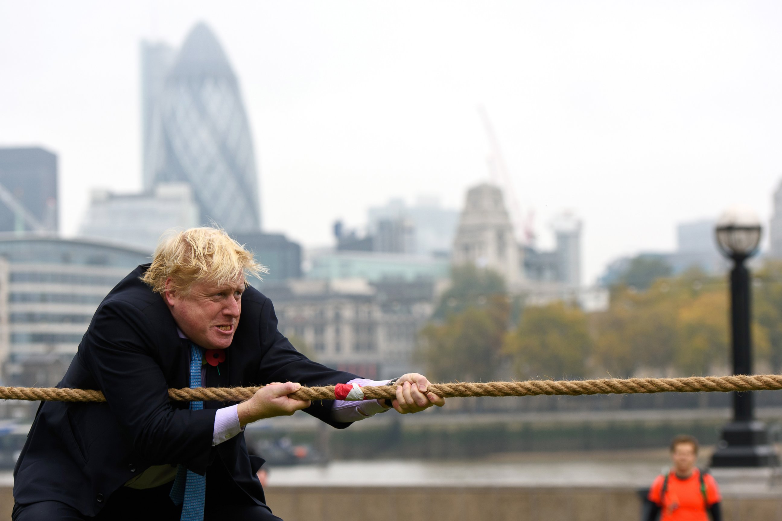 PHOTO: Mayor of London Boris Johnson competes in a tug of war during the launch of London Poppy Day on Oct. 27, 2015, in London.