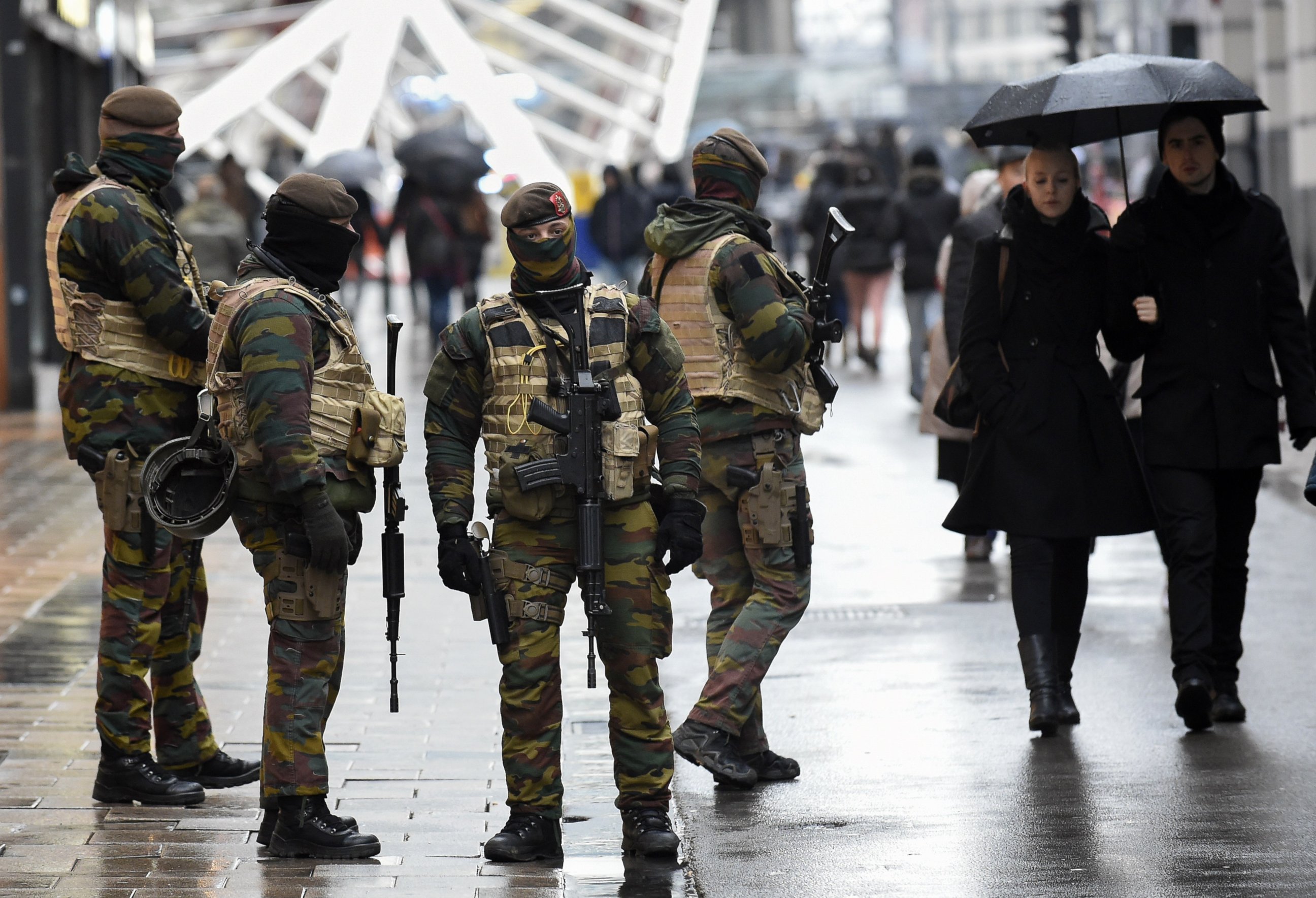 PHOTO: Soldiers patrol the Rue Neuve pedestrian shopping street in Brussels on November 21, 2015. 