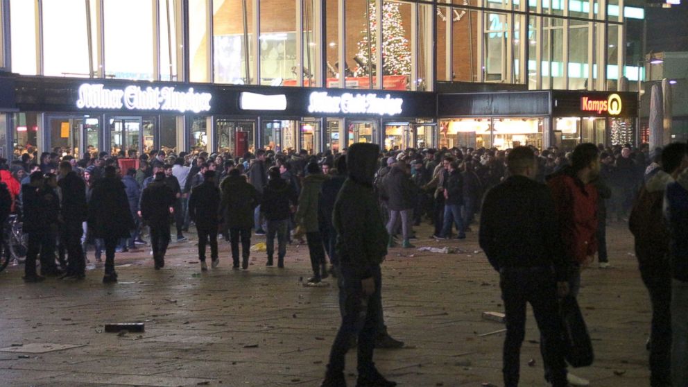 PHOTO:In this picture taken on Dec. 31, 2015, people gathering in front of the main railway station in Cologne, Germany.  