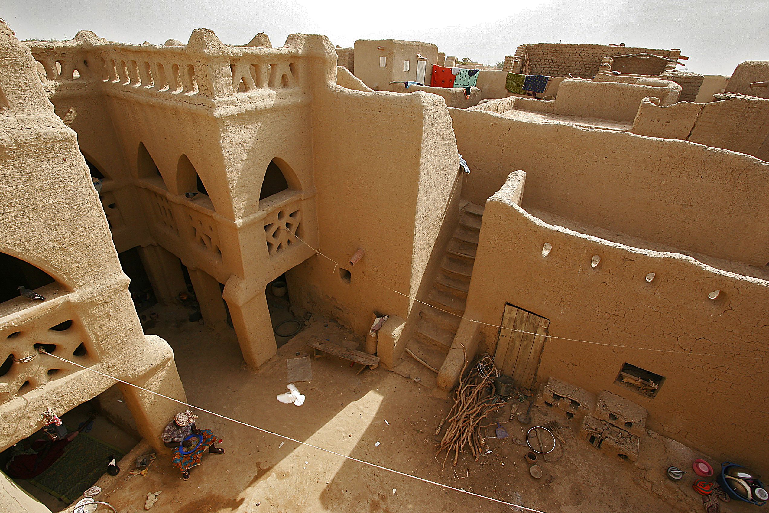 PHOTO: A woman rests in the courtyard of a large earthen mud house, in Djenne, in the Inner Niger Delta region in central Mali in this Feb. 9, 2005 file photo.