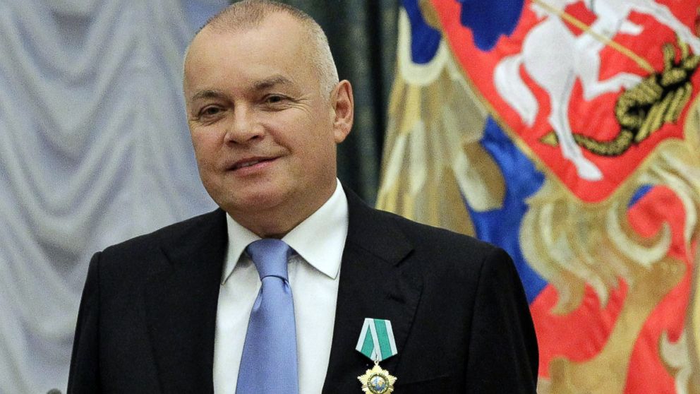 Russian television journalist Dmitry Kiselyov poses for a photo after receiving a medal of Friendship during an awarding ceremony in the Kremlin in Moscow, Oct. 10, 2011.