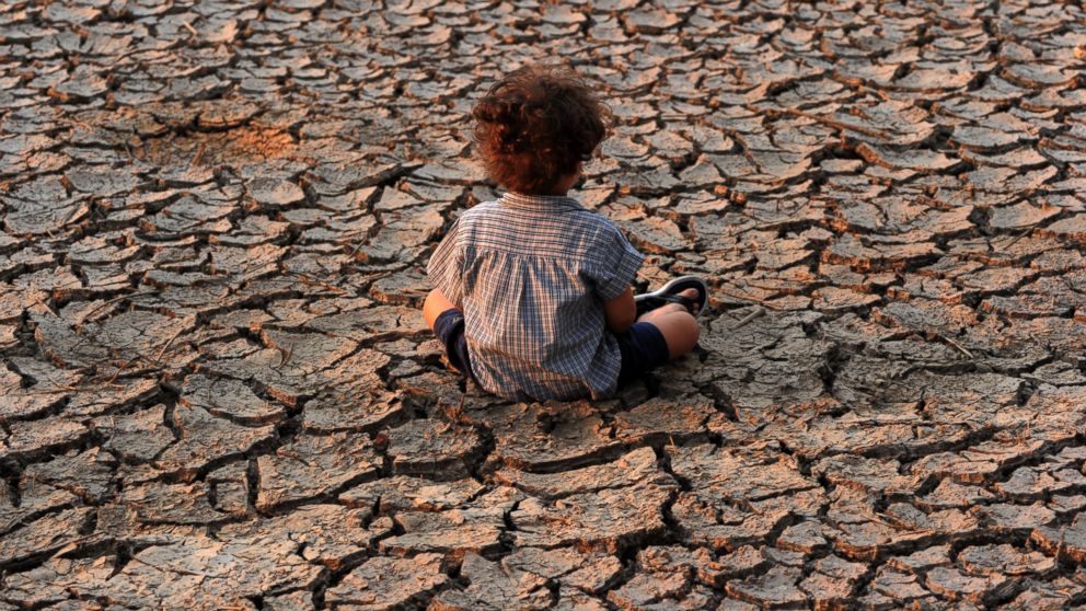 PHOTO: A child remains at an area affected by a drought on Earth Day in the southern outskirts of Tegucigalpa, Honduras, on April 22, 2016. 