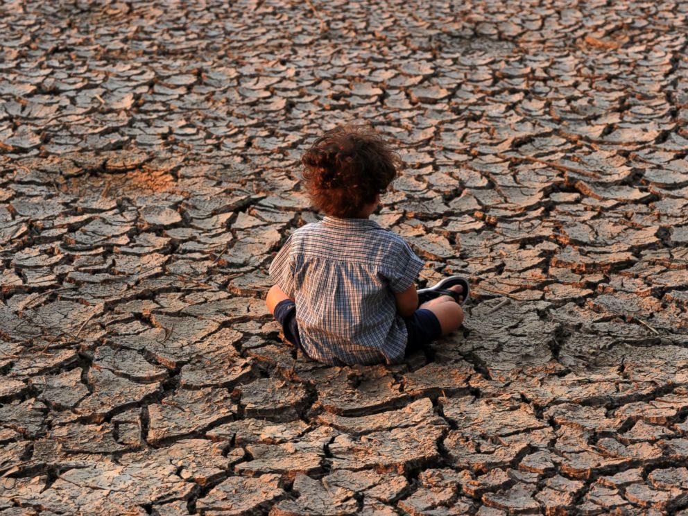 PHOTO: A child remains at an area affected by a drought on Earth Day in the southern outskirts of Tegucigalpa, Honduras, on April 22, 2016.