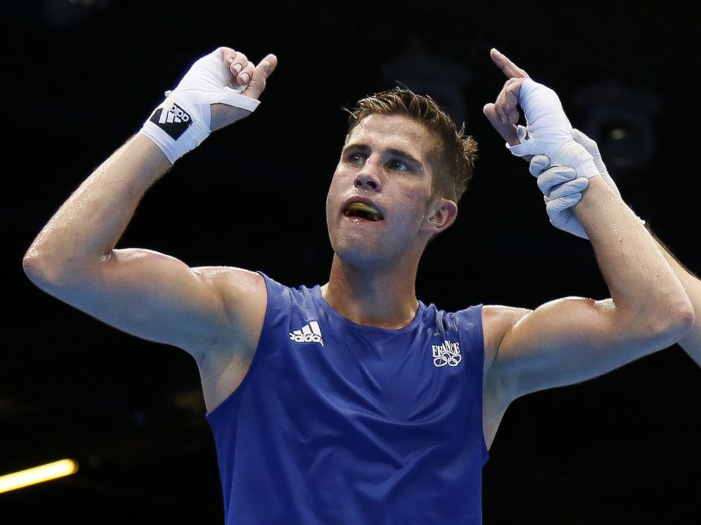 PHOTO: Alexis Vastine of France is declared winner over Tuvshinbat Byamba of Mongolia in their round of 16 Welterwight match of the London 2012 Olympic Games at the ExCel Arena on August 3, 2012 in London.