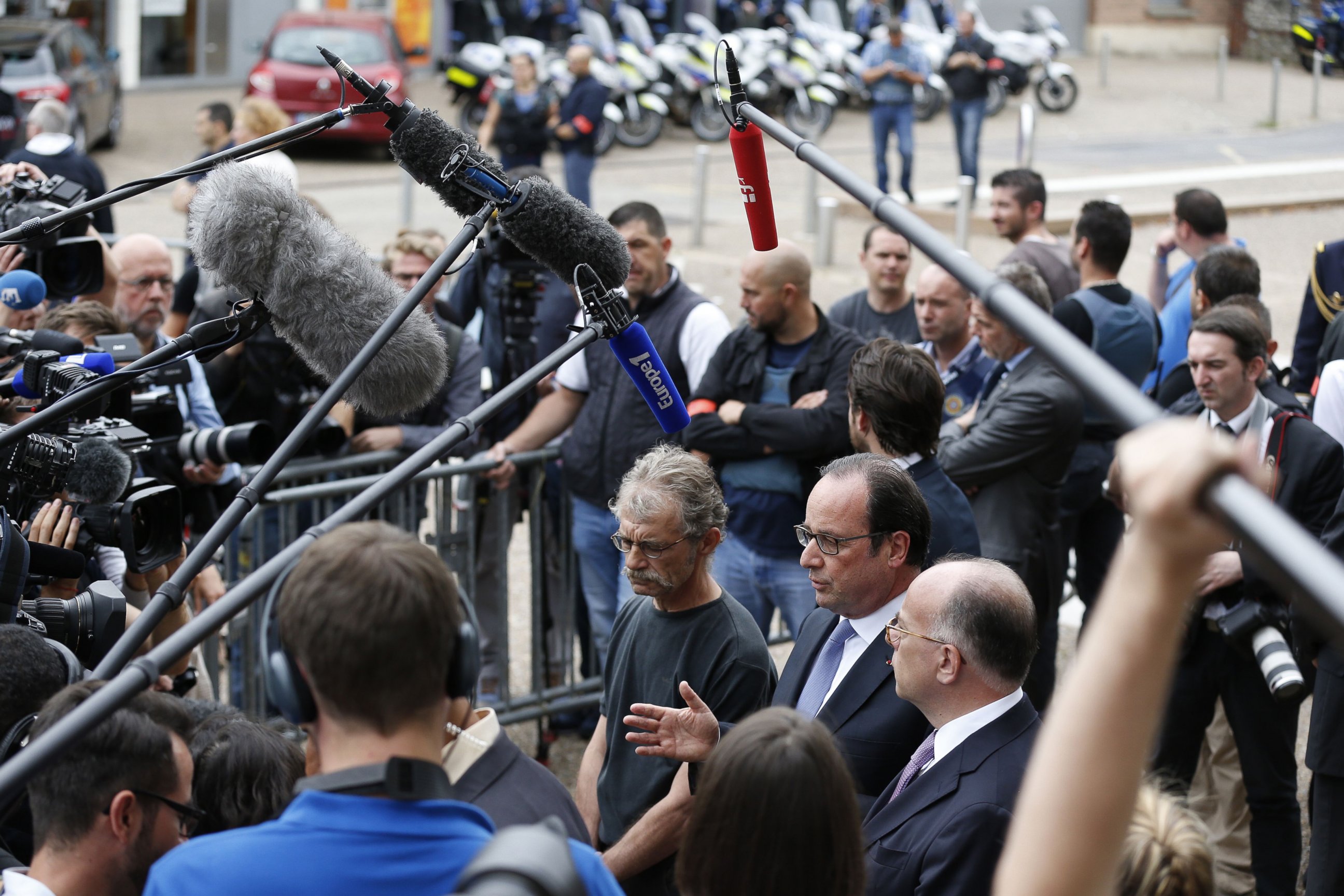 PHOTO: French President Francois Hollande speaks to the press as he leaves the Saint-Etienne-du-Rouvray's city hall following a hostage-taking at a church of the town on July 26, 2016 that left the priest dead. 