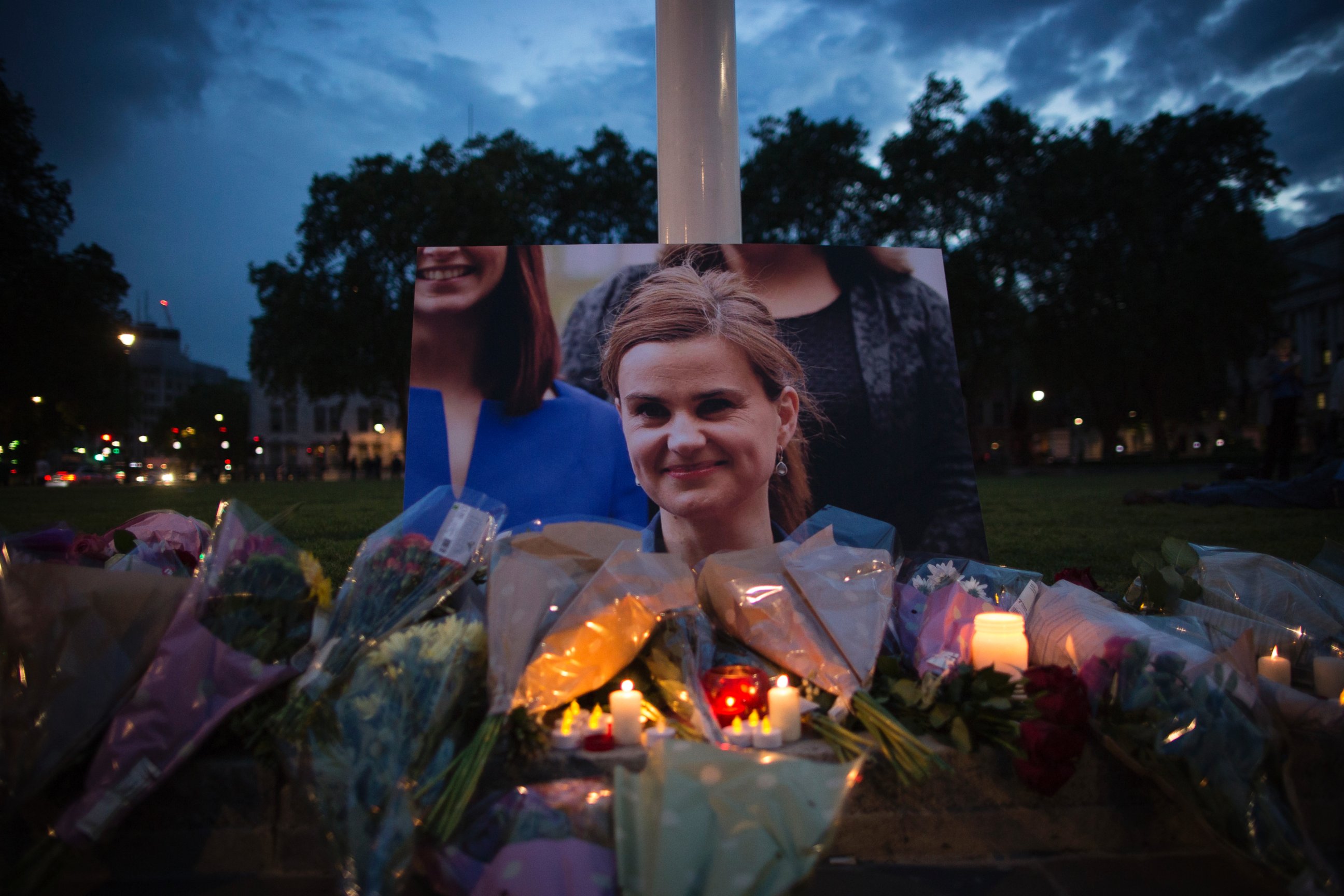 PHOTO: Flowers surround a picture of Jo Cox during a vigil in Parliament Square on June 16, 2016 in London, United Kingdom. Photo by Dan Kitwood/Getty Images