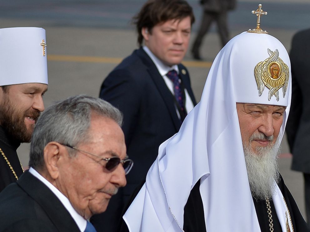 PHOTO: Cuban president Raul Castro, left welcomes Patriarch of Moscow and All Russia and Primate of the Russian Orthodox Church, Kirill, right, upon his arrival at Jose Marti International airport in Havana, on Feb. 11, 2016. 