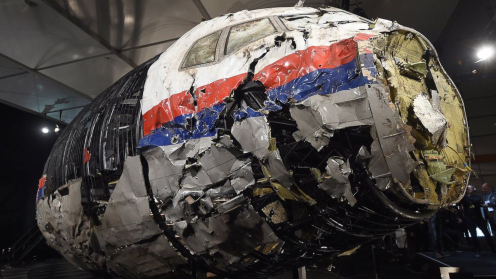 The wrecked cockpit of the Malaysia Airlines flight MH17 is presented to the press during a presentation of the final report on the cause of its crash at the Gilze Rijen airbase in The Netherlands on Oct. 13, 2015. 