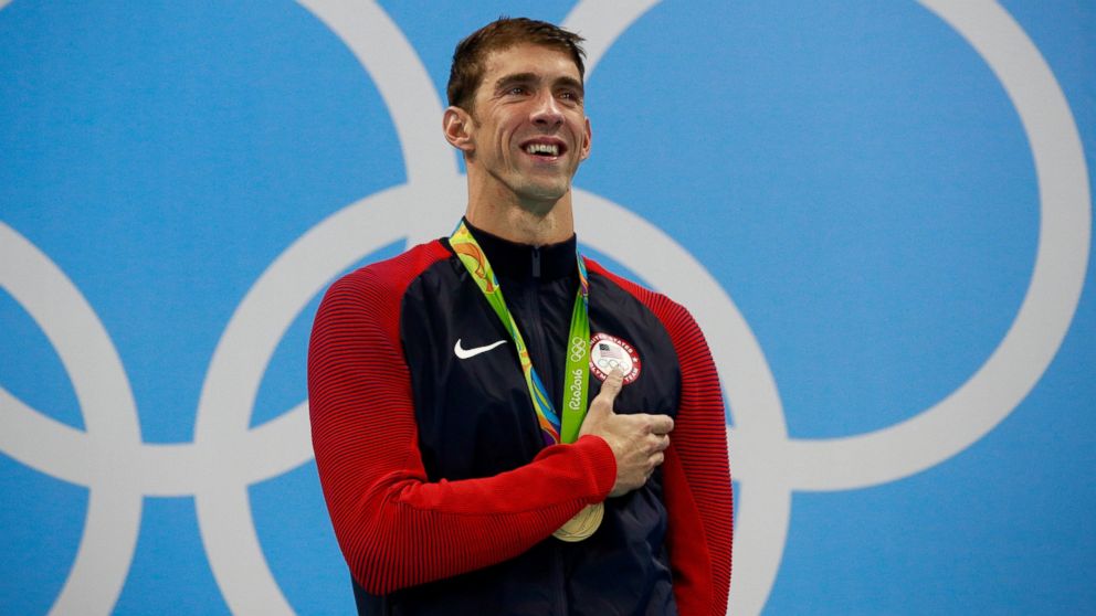 Gold medalist Michael Phelps of the United States poses on the podium during the medal ceremony for the Men's 200m Butterfly Final on Day 4 of the Rio 2016 Olympic Games on Aug. 9, 2016 in Rio de Janeiro.