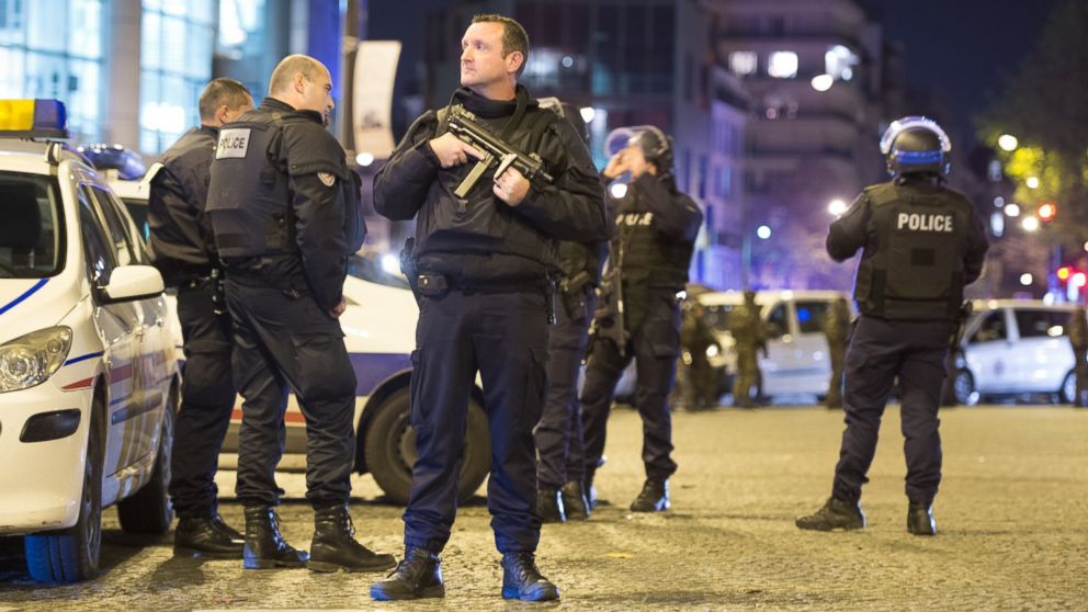 PARIS, FRANCE - NOVEMBER 13: Officials investigate the scene outside the Bataclan concert hall after an attack on November 13, 2015 in Paris, France. According to reports, over 150 people were killed in a series of bombings and shootings across Paris, including at a soccer game at the Stade de France and a concert at the Bataclan theater. 