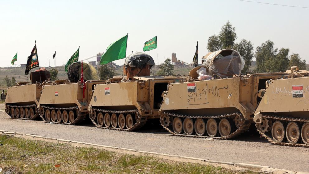 PHOTO: Iraqi Army and volunteer fighters prepare at Sedull Udeyim region before an operation against ISIS fighters in Tikrit, Iraq on March 1, 2015.