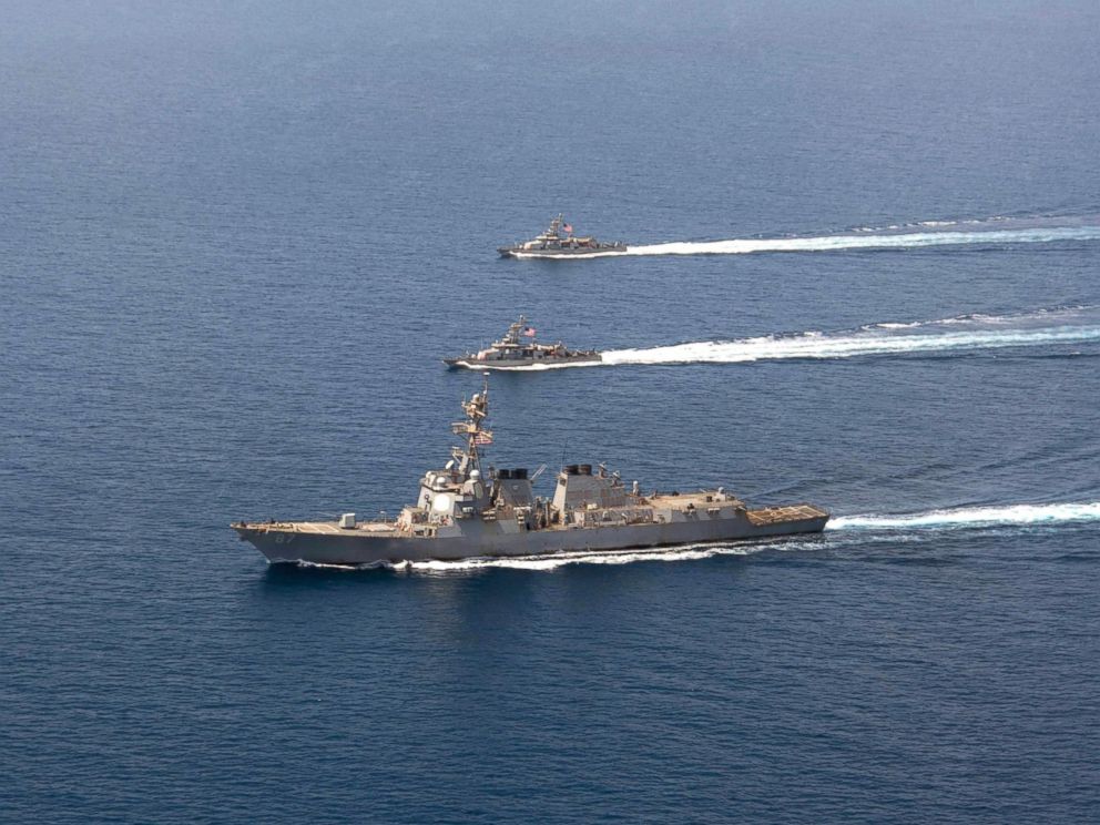 PHOTO: A file image released by the US Navy shows a guided-missile destroyer USS Mason (DDG 87) conducting formation exercises with the Cyclone-class patrol crafts USS Tempest (PC 2) and USS Squall (PC 7), on Sept. 10, 2016.