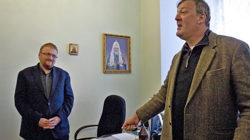 Russian lawmaker Vitaly Milonov speaks with British actor Stephen Fry as they meet at the city parliament in Saint Petersburg,  March 14, 2013. 
