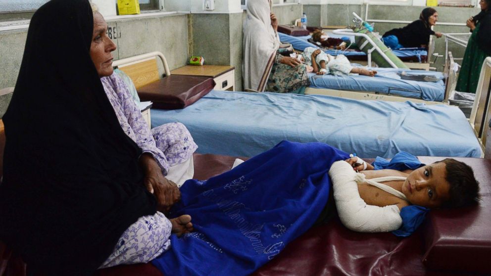 Wounded Afghani are treated at hospitals after Taliban militants attack the Afghan intelligence service office in Jalalabad, Afghanistan, Aug. 30, 2014. 