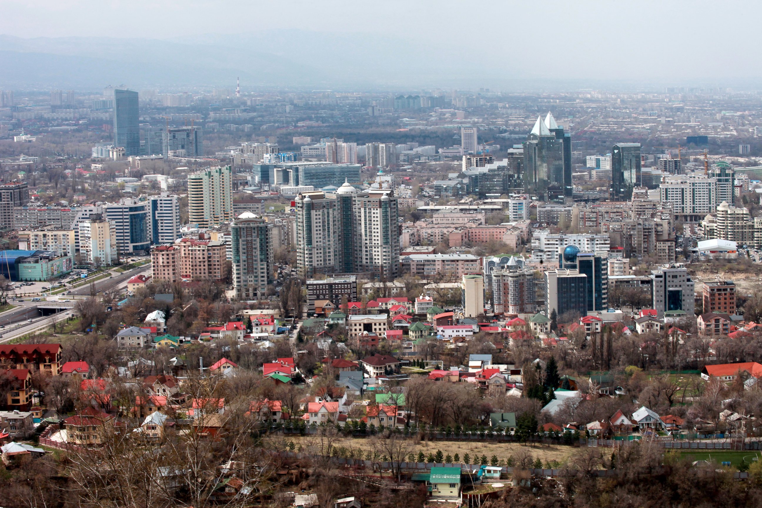 PHOTO: High and low rise buildings stand on the city skyline in Almaty, Kazakhstan, April 9, 2012.