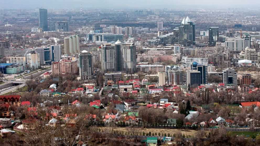 PHOTO: High and low rise buildings stand on the city skyline in Almaty, Kazakhstan, April 9, 2012.