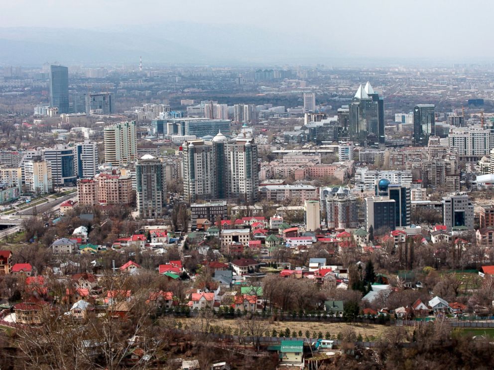 PHOTO: High and low rise buildings stand on the city skyline in Almaty, Kazakhstan, April 9, 2012.