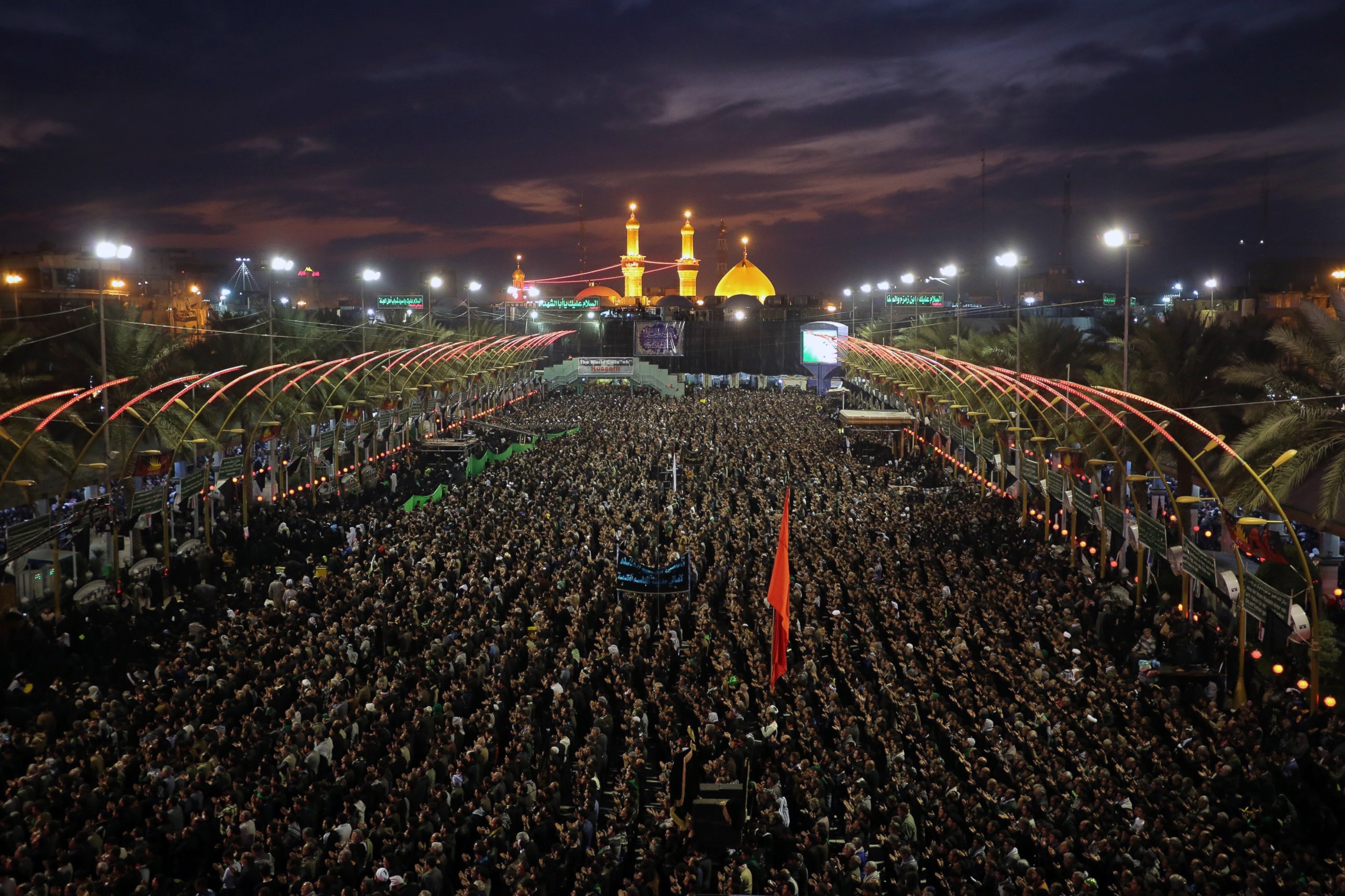 PHOTO: Shi'ite people gather during the Arba'een ceremony in the holy city of Karbala, southern Iraq, Dec. 12, 2014.