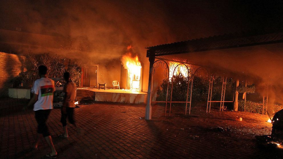 A vehicle and the surrounding buildings burn after they were set on fire inside the US consulate compound in Benghazi, Libya, Sept. 11, 2012. 