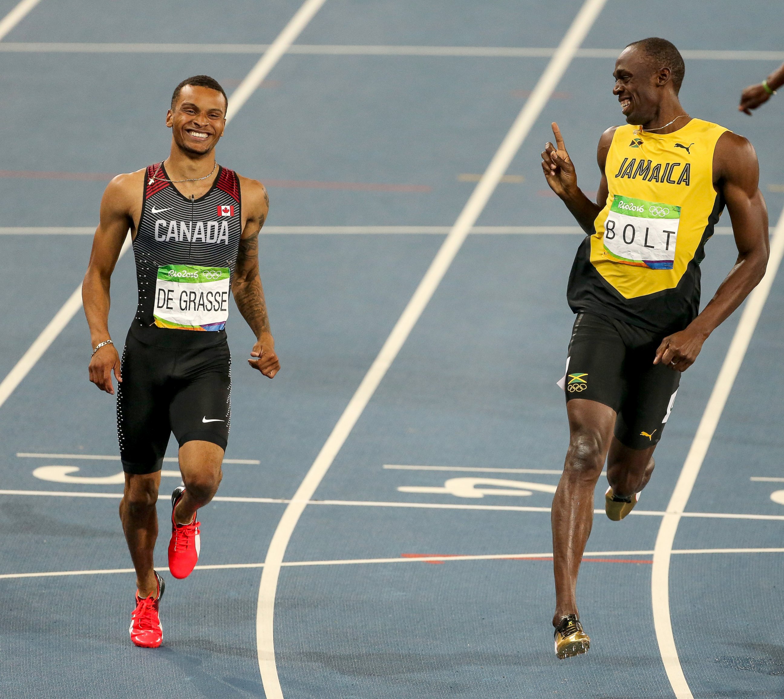 PHOTO: Andre de Grasse of Canada and Usain Bolt of Jamaica compete in the Men's 200m semi finals of the Rio 2016 Olympic Games in Rio de Janeiro, Aug. 17, 2016.