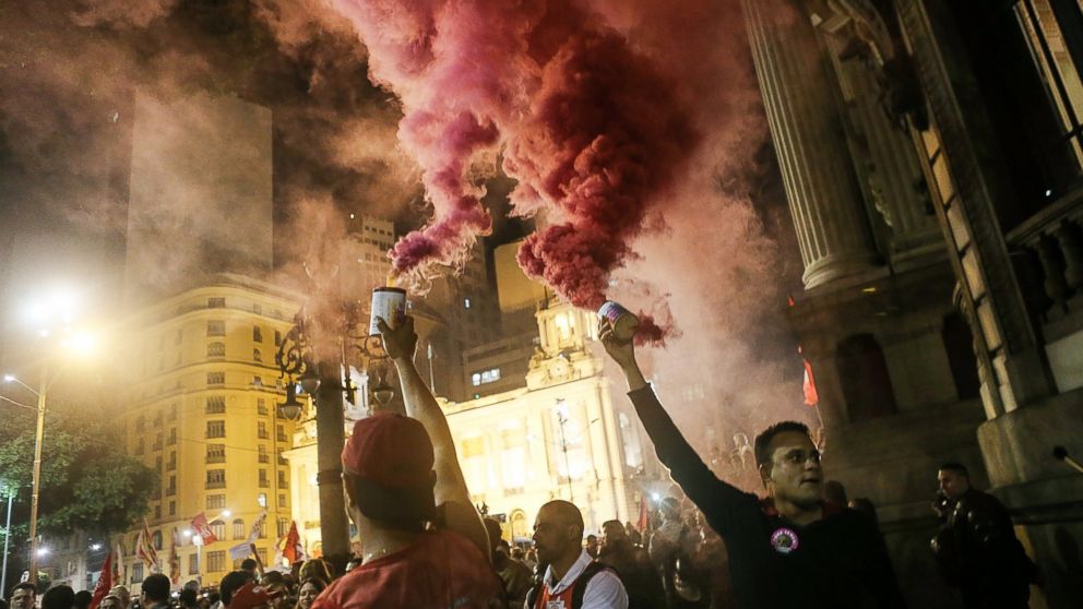 Supporters of suspended President Dilma Rousseff protest at a rally against interim President Michel Temer on June 10, 2016, in Rio de Janeiro. Impeachment proceedings against Rousseff continue as Temer rules the country on an interim basis ahead of the Rio 2016 Olympic Games.
