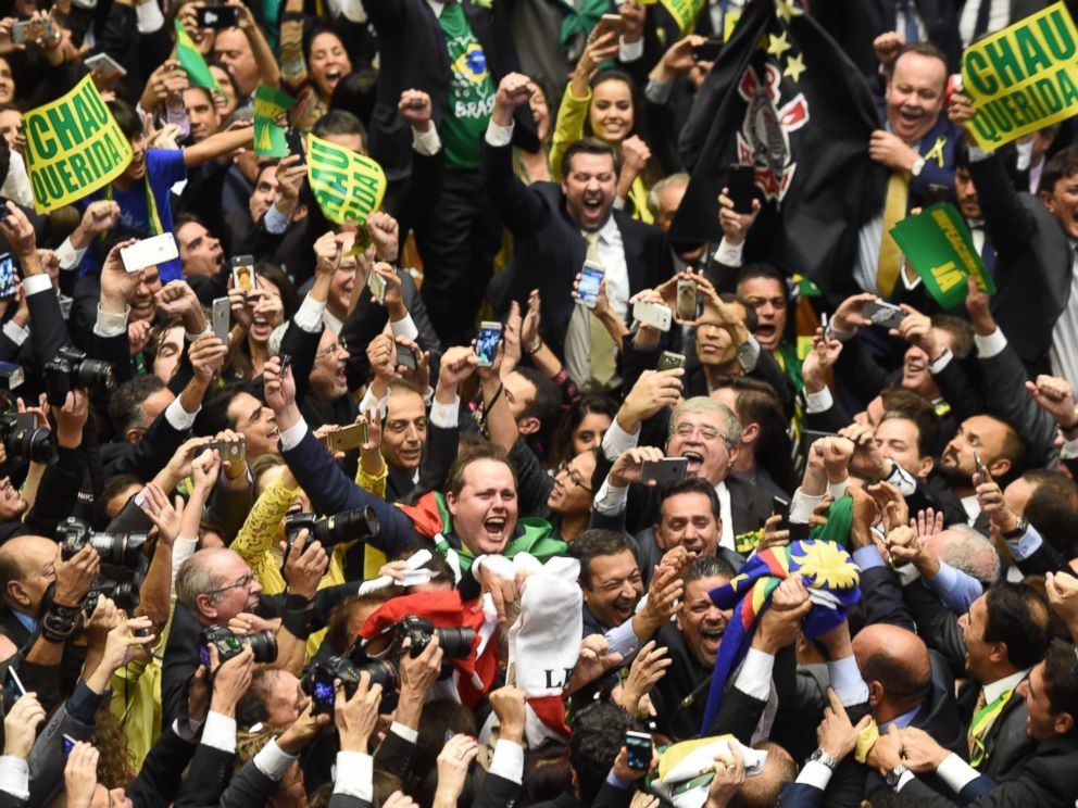 PHOTO: Brazils lawmakers celebrate after they reached the votes needed to authorize President Dilma Rousseffs impeachment to go ahead, at the Congress in Brasilia, April 17, 2016.