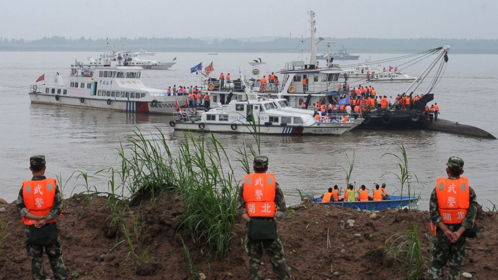 Rescue teams search for survivors near the Dongfangzhixing or "Eastern Star" vessel, which sank in the Yangtze River in Jianli, central China's Hubei province, on June 2, 2015. 