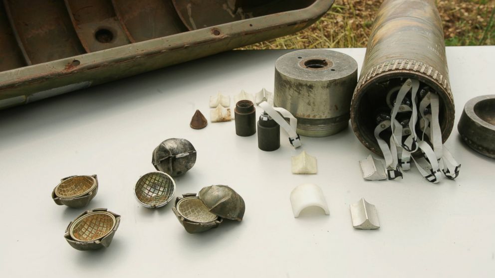 Parts of a cluster bomb are displayed, April 20, 2007, in Tibnin, Lebanon.
