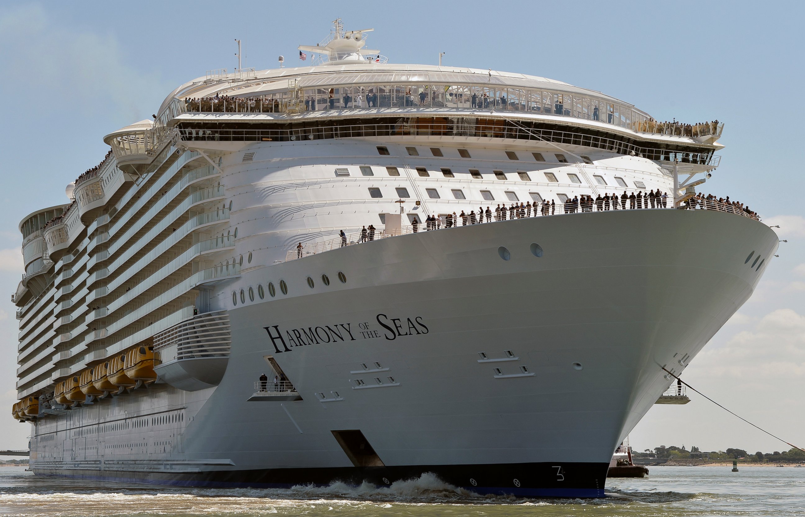 PHOTO: A photo taken on May 15, 2016 shows the Harmony of the Seas cruise ship as it sails from the STX Saint-Nazaire shipyard, western France, out to sea. 