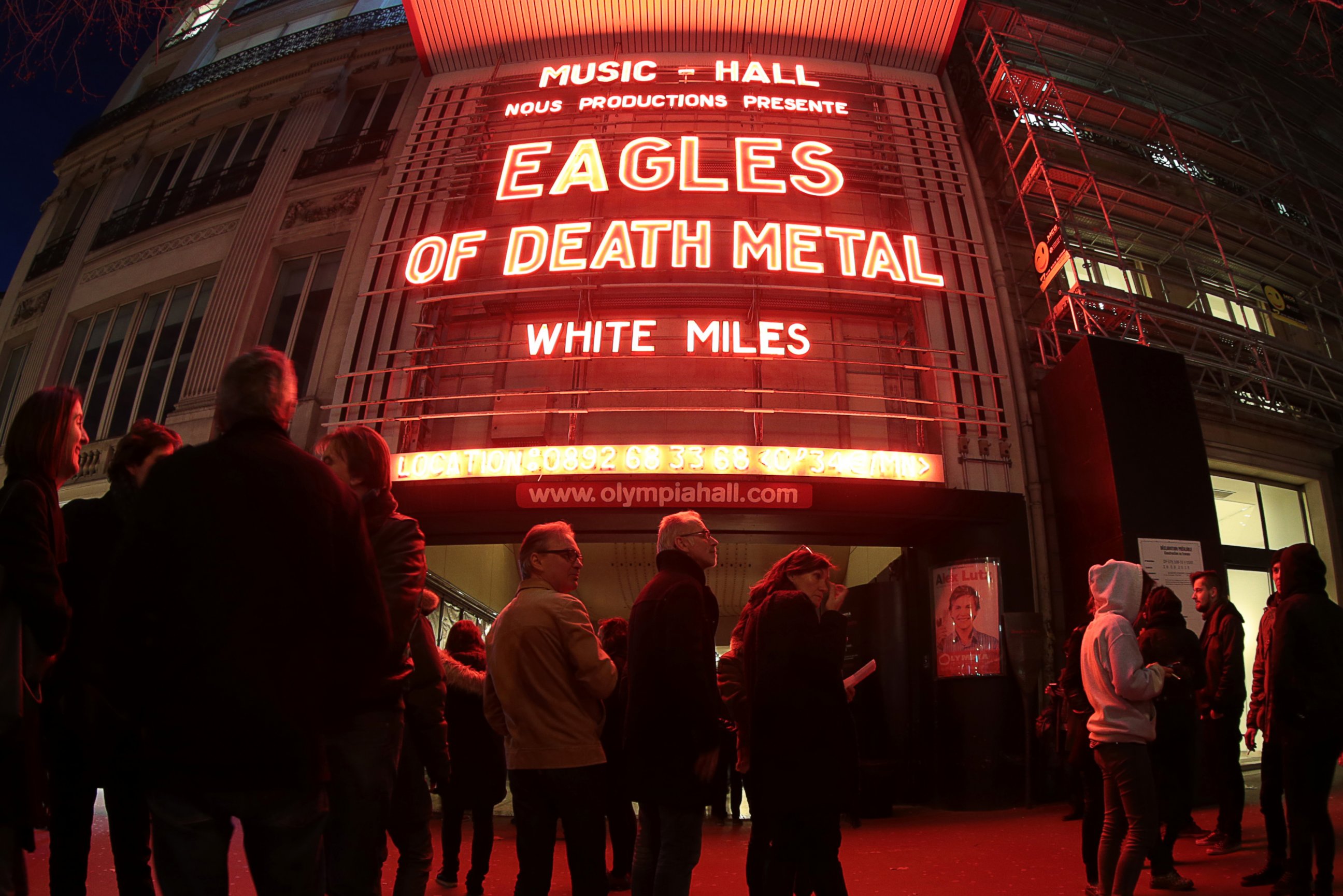 PHOTO: People standing outside the Olympia concert venue in Paris, a few hours ahead of a concert by Eagles of Death Metal, Feb. 16, 2016. 