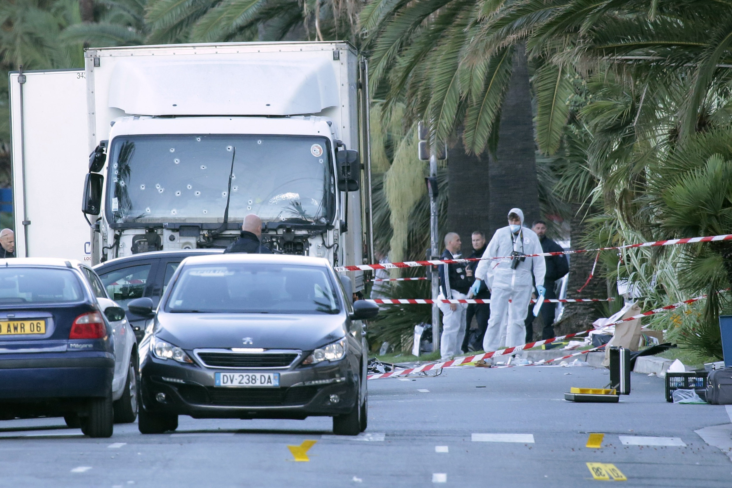 PHOTO: Forensic police investigate a truck at the scene of a terror attack on the Promenade des Anglais, July 15, 2016 in Nice, France.