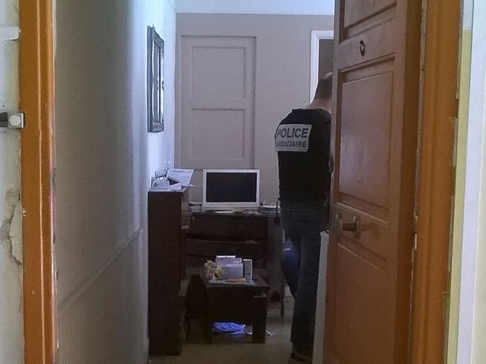PHOTO: French police officers look for evidence in an apartment following the attack, July 15, 2016, in Nice, France.