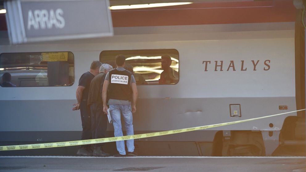 PHOTO: Crime investigators look into the window of a Thalys train of French national railway operator SNCF at the main train station in Arras, northern France, Aug. 21, 2015. 
