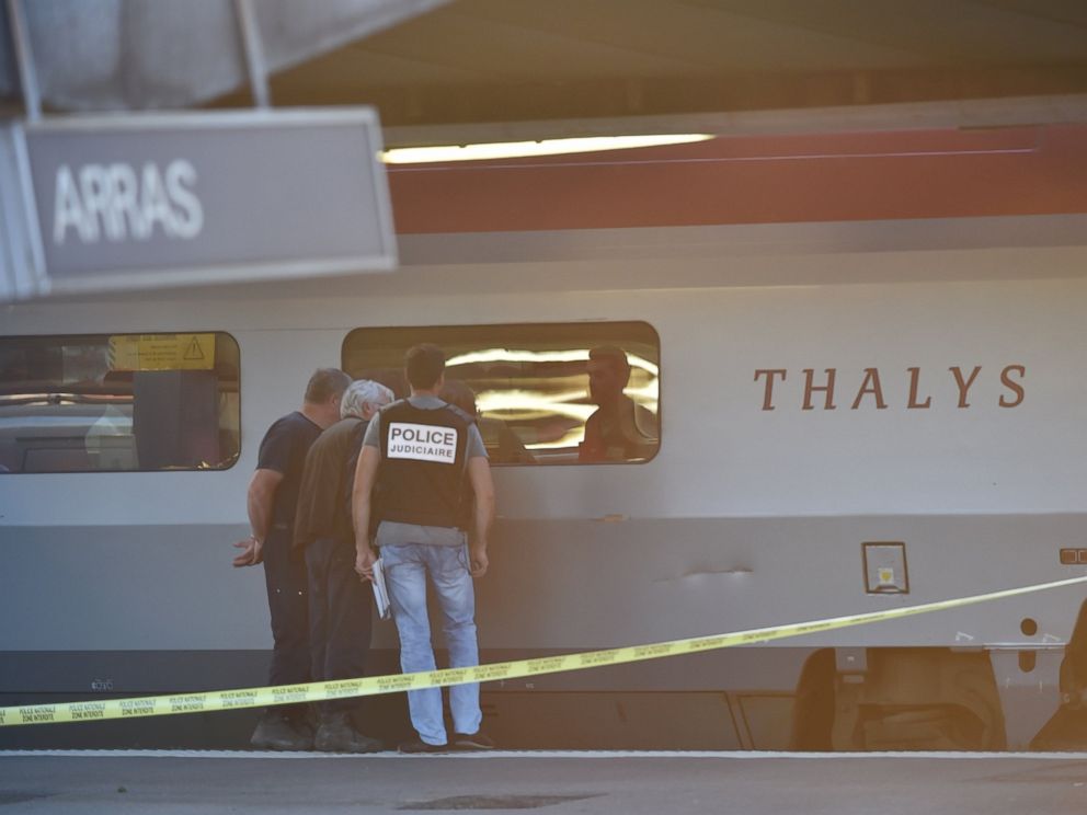 PHOTO: Crime investigators look into the window of a Thalys train of French national railway operator SNCF at the main train station in Arras, northern France, Aug. 21, 2015.