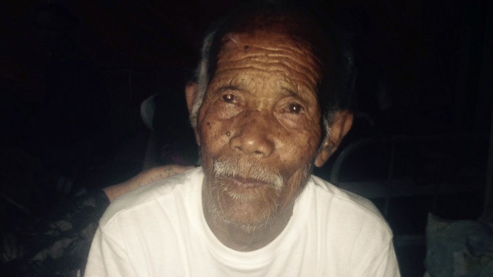 Funchu Tamang, 101, sits on a bed in a hospital in Nuwakot district on May 3, 2015 around 80 kilometres (50 miles) northwest of Kathmandu where he was taken after being rescued from his collapsed home a day earlier.  
