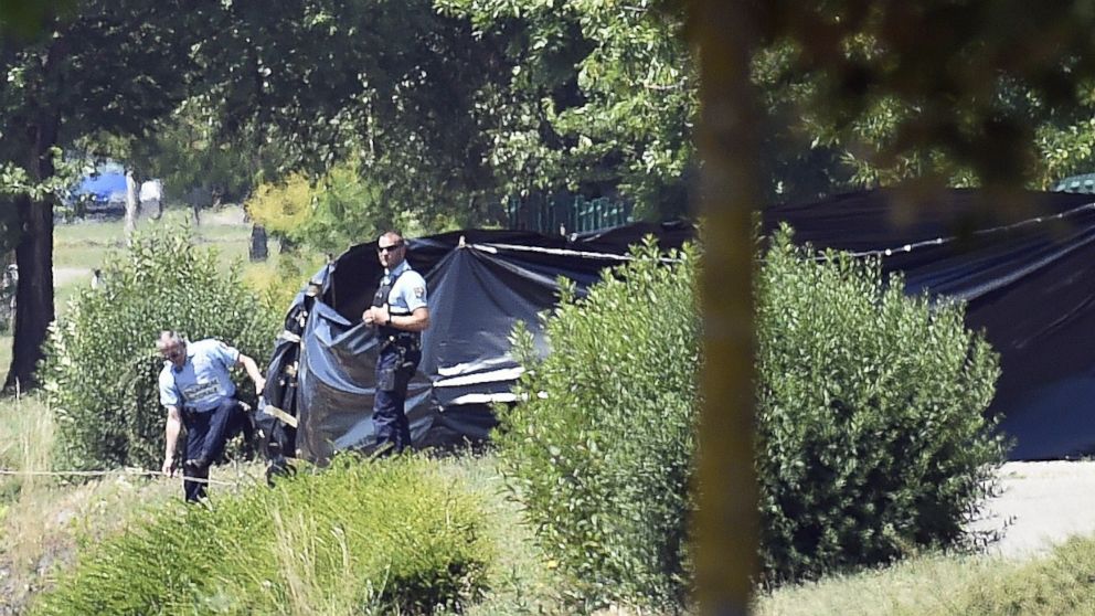 PHOTO: French security stand next to the enclosed area near the Air Products company in Saint-Quentin-Fallavier, near Lyon, central eastern France, June 26, 2015.