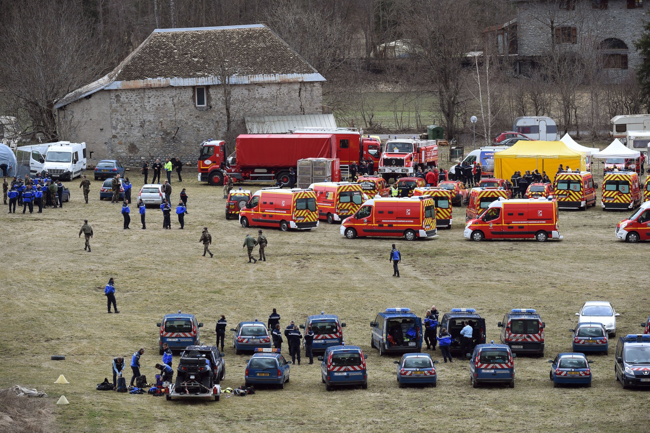 PHOTO:French emergency services workers and members of the French gendarmerie gather in Seyne, near the site where a Germanwings Airbus A320 crashed in the French Alps, March 24, 2015.