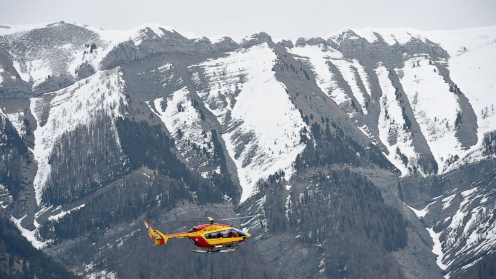 PHOTO: A helicopter of the French civil security services flies near Seyne, south-eastern France, March 24, 2015.