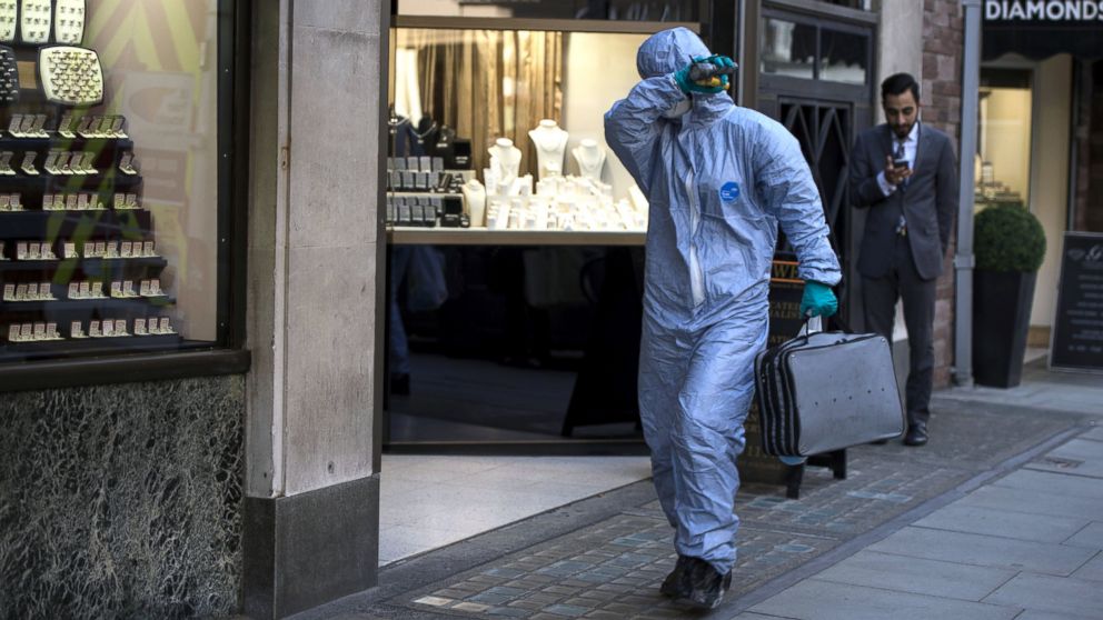 A forensic expert arrives at the Hatton Garden Safe Deposit Limited in London, April 7, 2015.
